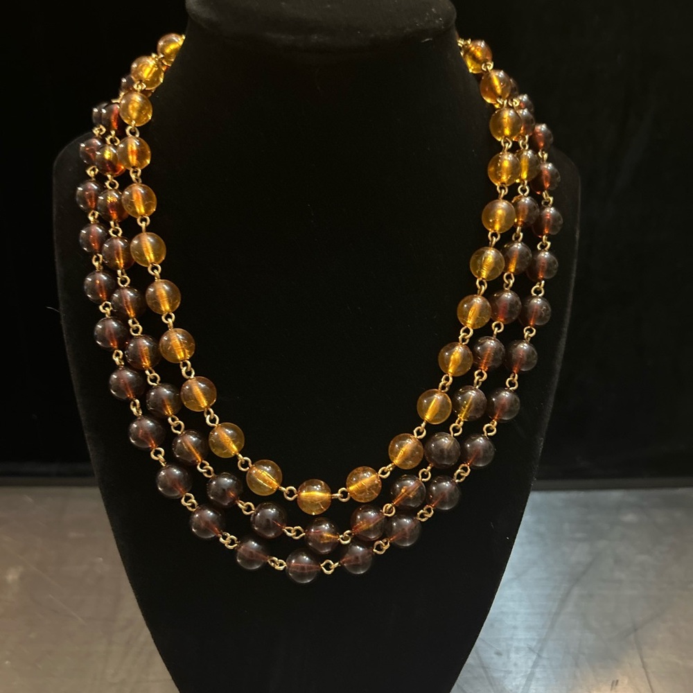 Vintage Monet brown and yellow bead triple strand necklace about 19’